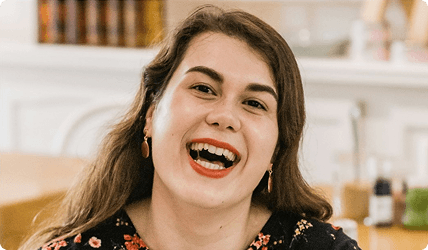 Student smiling during an online lesson